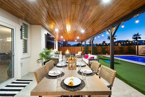 Outdoor dining - Emerald Bay w/ Pool, Spa, Golf, Game room & more! (Coachella)