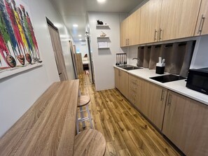 Fridge, microwave, stovetop, coffee/tea maker