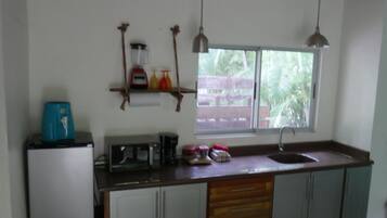 Mini-fridge, microwave, eco-friendly cleaning products