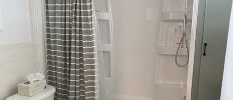Hair dryer, towels, soap, toilet paper