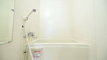 Family Suite | Bathroom | Separate tub and shower, hair dryer, slippers, bidet