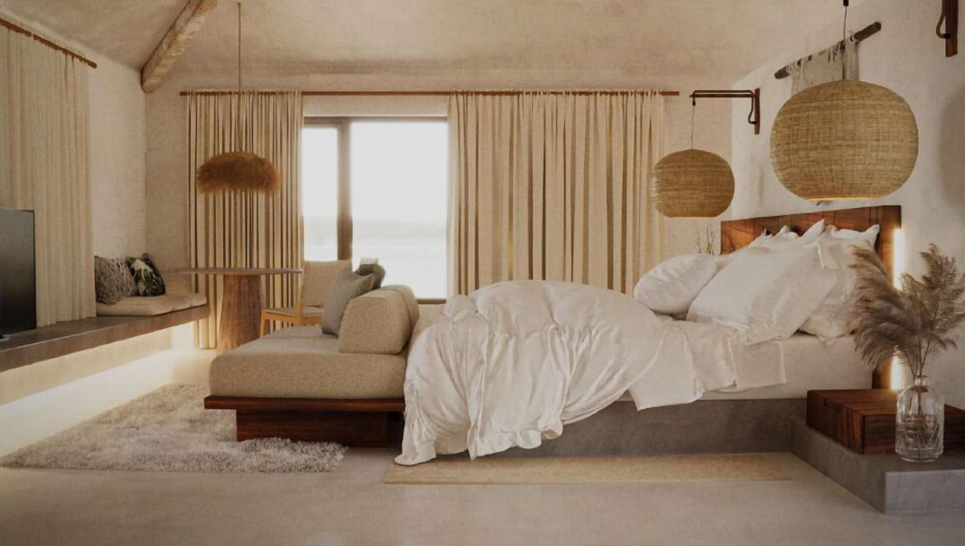 Luxe beddengoed, een minibar, een kluis op de kamer, een bureau