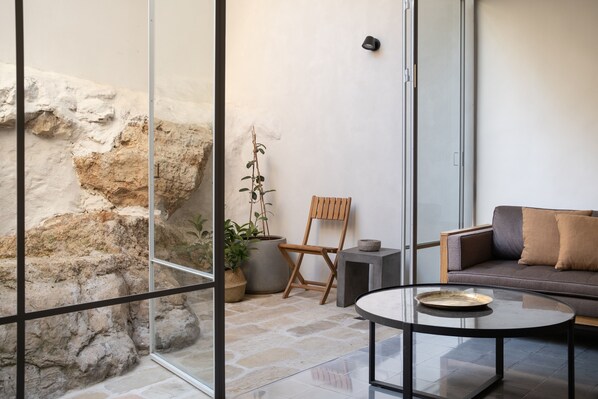 Deluxe Suite, 2 Bedrooms, Patio | Living area | 50-inch Smart TV with digital channels, TV, streaming services - KHAN EIN KAREM BOUTIQUE HOTEL (Jerusalem)