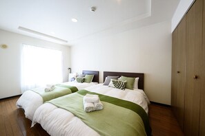 Familie suite | 1 slaapkamer, een strijkplank/strijkijzer, gratis wifi, beddengoed