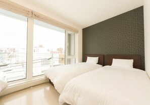 Habitación | 4 dormitorios, tabla de planchar con plancha, wifi gratis y ropa de cama