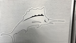 A perforated metal wall with a dolphin silhouette. - Affordable Rare Tommy bahama skeeps 2+ in half moon bay (Mill Valley)