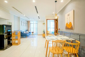 Classic Apartment, 1 Bedroom | Living area | 48-inch flat-screen TV with cable channels, TV - VINHOMES CENTRAL PARK - Saigon Apartment (Ho Chi Minh City)