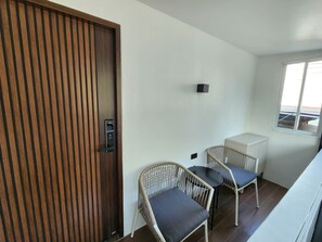 Deluxe-Zimmer | Wohnbereich | Fernseher