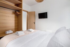 3 dormitorios, tabla de planchar con plancha, wifi gratis y ropa de cama