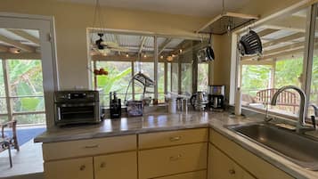 Fridge, microwave, stovetop, coffee/tea maker