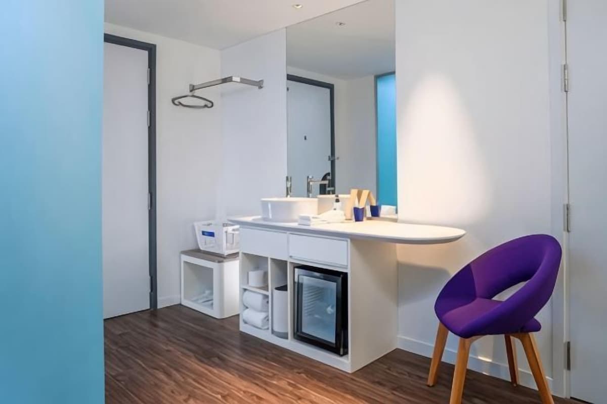Bathroom | Shower, rainfall showerhead, designer toiletries, hair dryer