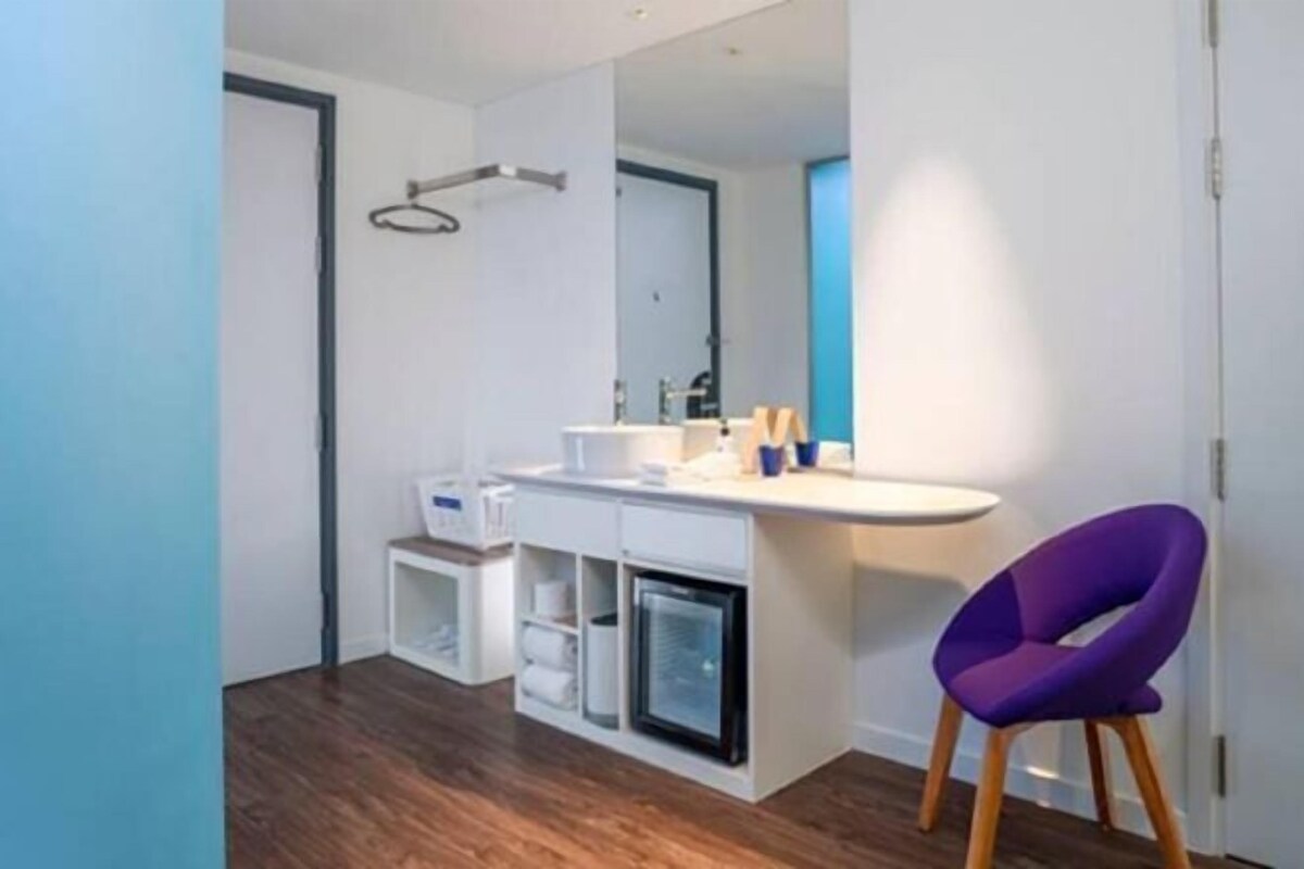 Shower, rainfall showerhead, designer toiletries, hair dryer
