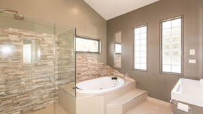 Combined shower/bathtub, jetted bath, towels