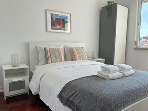 Basic Double Room, Shared Bathroom | Laptop workspace, free WiFi, bed sheets