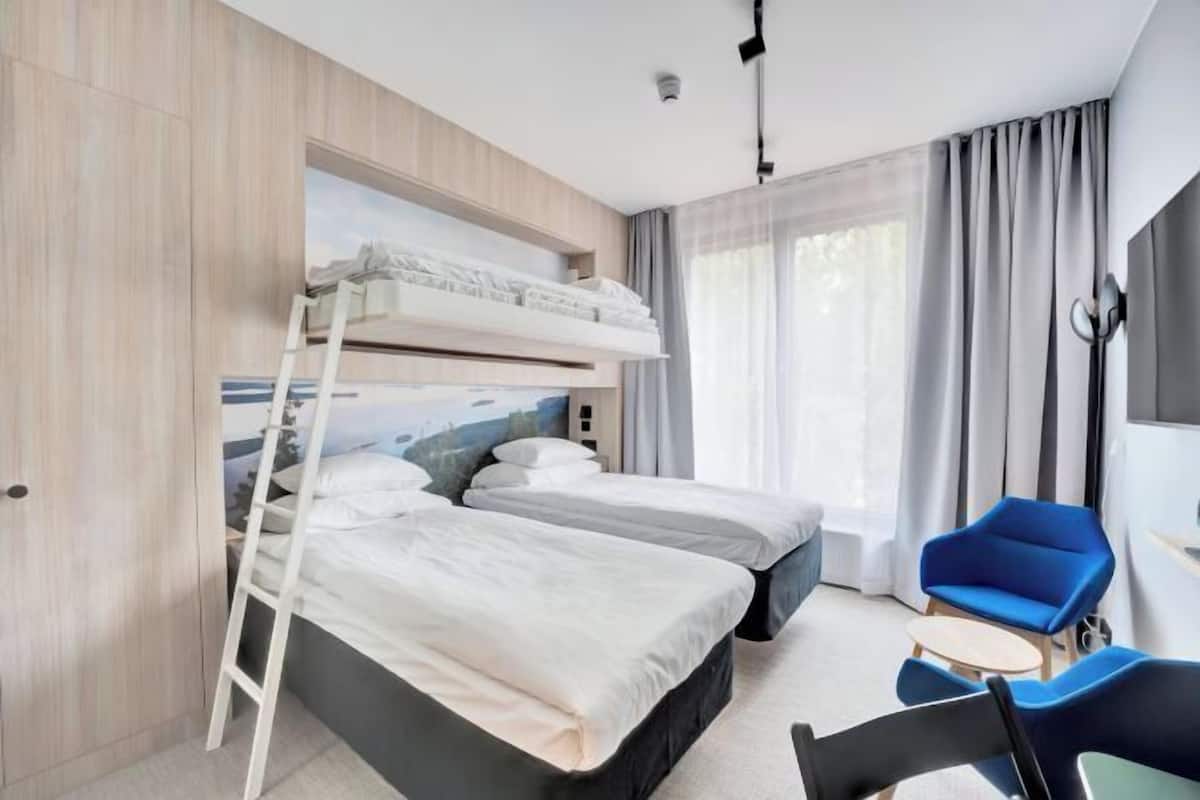 Laptop workspace, blackout curtains, iron/ironing board