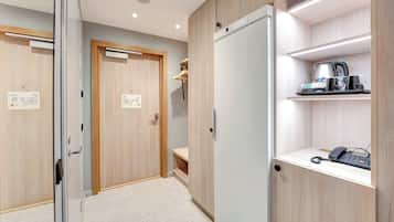 Standard Quadruple Room | Laptop workspace, blackout drapes, iron/ironing board