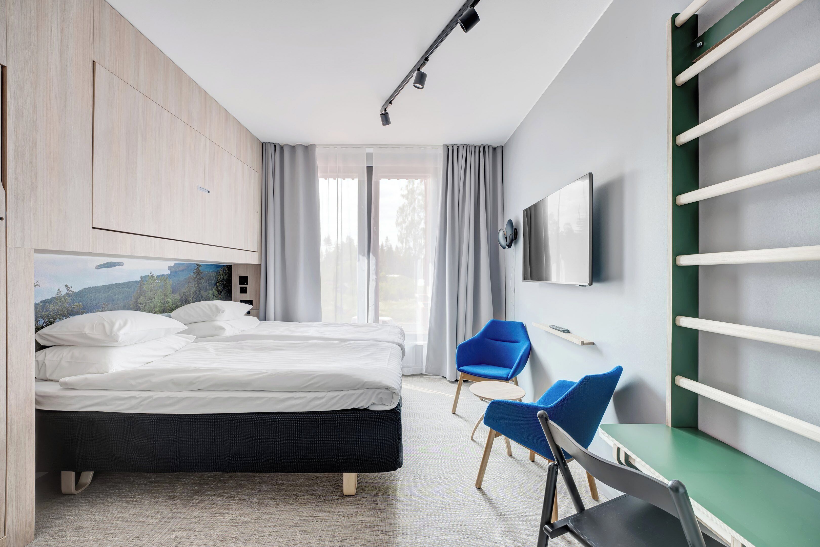 Habitación estándar con 2 camas individuales (Extra bed possible) | Espacio para trabajar con laptop y cortinas blackout 