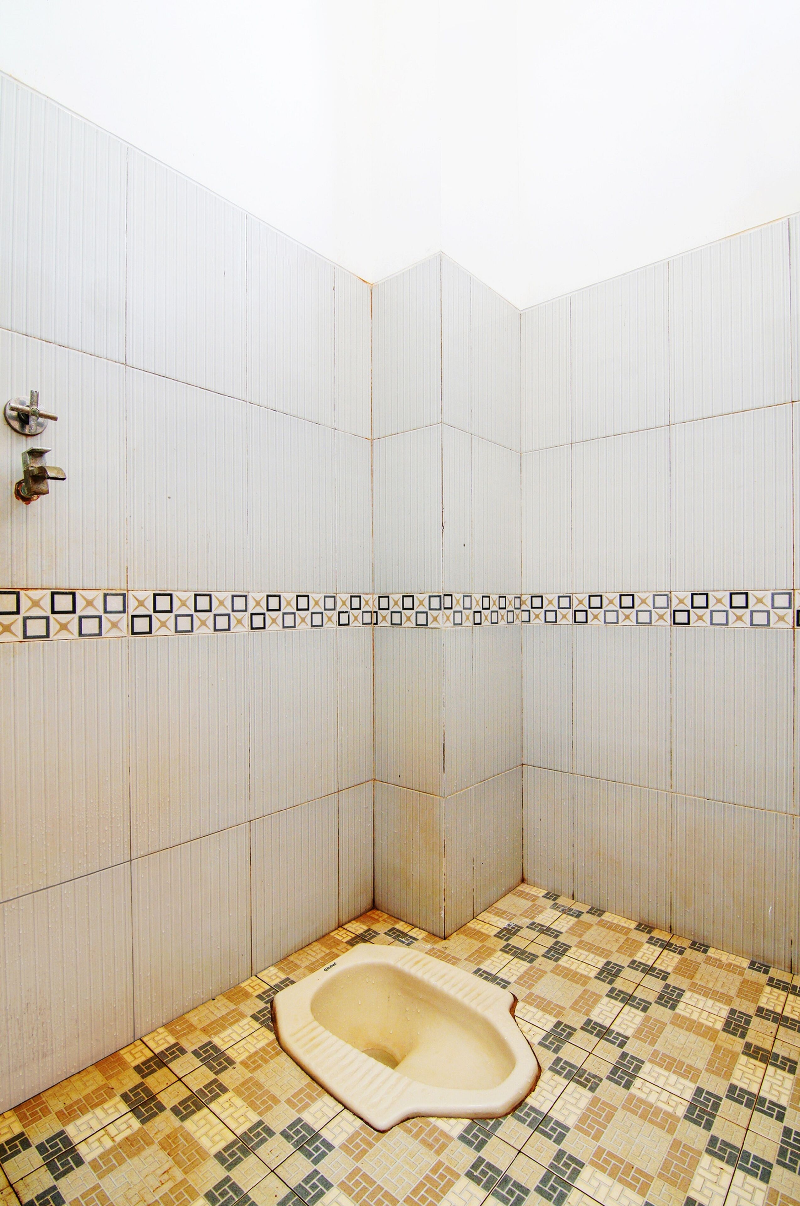 SPOT ON 91598 Oklahoma Homestay Syariah