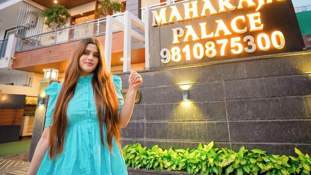 A modern building with a sign reading "MAHARAJA PALACE 9810875300". - Maharaja Palace Near Medanta Gurgaon  (Gurugram)