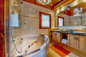 Jetted tub, hair dryer, towels, soap