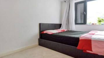 4 bedrooms, desk, iron/ironing board, travel cot