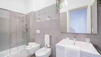 Standard Apartment, Multiple Bedrooms, Mountainside (Residenza Castello) | Bathroom | Shower, hair dryer, bidet, towels