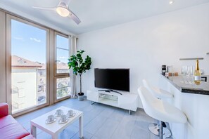 Standard Apartment, Multiple Bedrooms, Mountainside (Residenza Castello) | Living area | 21-inch TV with cable channels