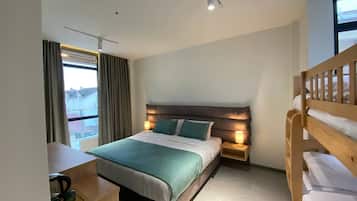 Deluxe Quadruple Room | Premium bedding, Select Comfort beds, in-room safe