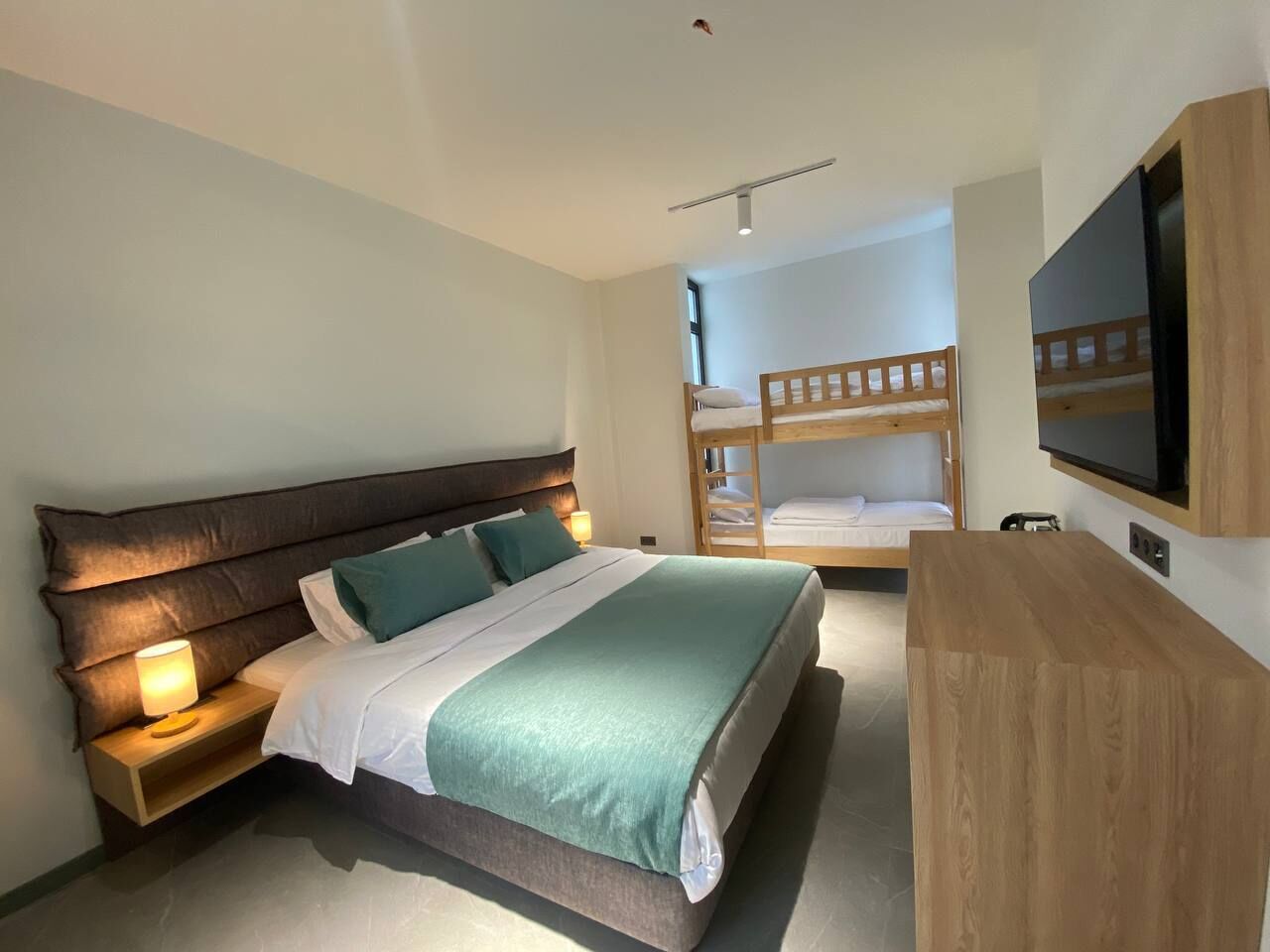 Deluxe Quadruple Room | Premium bedding, Select Comfort beds, in-room safe