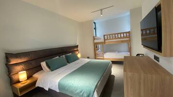 Deluxe Quadruple Room | Premium bedding, Select Comfort beds, in-room safe