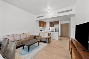 Apartment | Living area | 42-inch Smart TV with satellite channels, TV, Netflix - La Mer La Cote Bldg 2bdrms and Pool (Dubai)