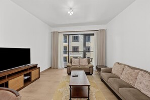 Apartment | Living area | 42-inch Smart TV with satellite channels, TV, Netflix - La Mer La Cote Bldg 2bdrms and Pool (Dubai)