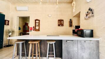 Luxury Apartment | Private kitchen | Mini-fridge, microwave, stovetop, coffee/tea maker