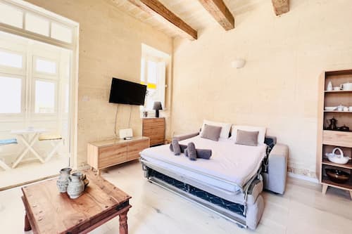 Luxury Apartment | Living area | 70-cm Smart TV with digital channels, TV, streaming services