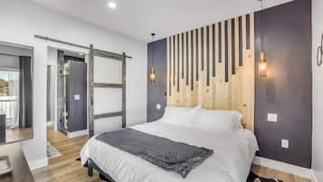 1 habitación, tabla de planchar con plancha y cuna de viaje