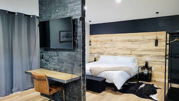 1 bedroom, desk, iron/ironing board, travel crib