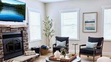 Smart TV, fireplace, DVD player, books