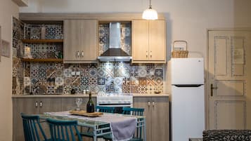 Apartamento clássico | Cozinha privada | Geladeira, cafeteira/chaleira, chaleira elétrica, torradeira