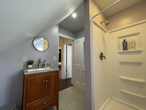 Hair dryer, towels, soap, shampoo