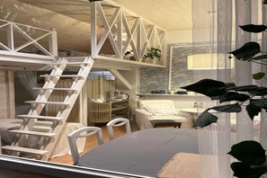 A compact, multi-level bedroom with a bunk bed, a desk, and a chair. - Holiday home in the countryside, with pool, garden (Rozewko)