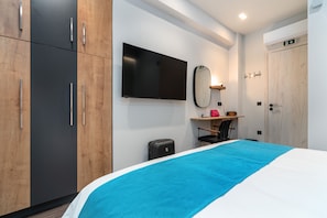 Suite Deluxe | 1 dormitori, roba de llit d'alta qualitat, cobrellits i minibar