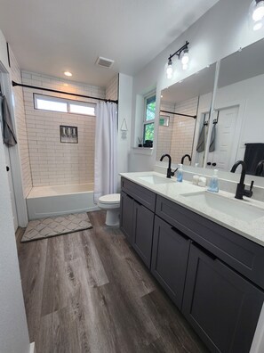 Hair dryer, towels, soap, shampoo