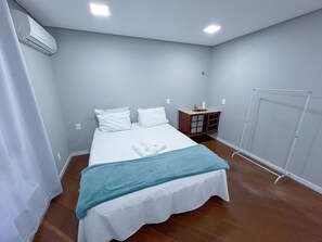 Family Room, Shared Bathroom | Iron/ironing board, free WiFi, bed sheets - Espaço 386 (Blumenau)