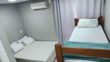 Kamar Double Keluarga, kamar mandi pribadi | Setrika/meja setrika, Wi-Fi gratis, dan seprai linen