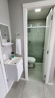 Family Room, Private Bathroom | Bathroom | Hair dryer, towels