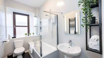 Hair dryer, towels, soap, shampoo