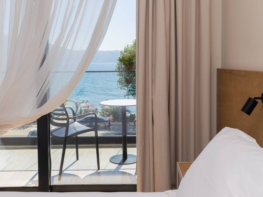 Triple Room, Sea View | Hypo-allergenic bedding, minibar, desk, soundproofing