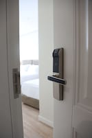 Triple Room, Sea View | Hypo-allergenic bedding, minibar, desk, soundproofing