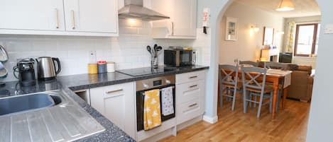 Fridge, dishwasher, cookware/dishes/utensils