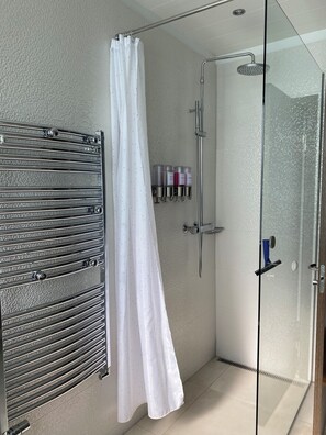 Shower, hair dryer, towels, soap